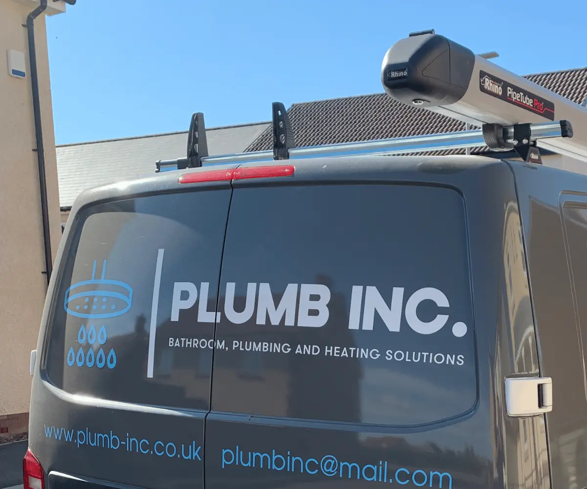 Plumb Inc plumbing and heating company van in Taunton, Somerset, displaying the company branding and bathroom, plumbing and heating services.
